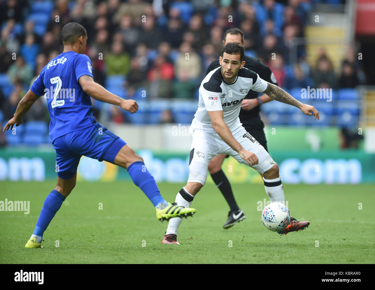 Cardiff City's Lee Peltier and Derby County's Bradley Johnson (right ...
