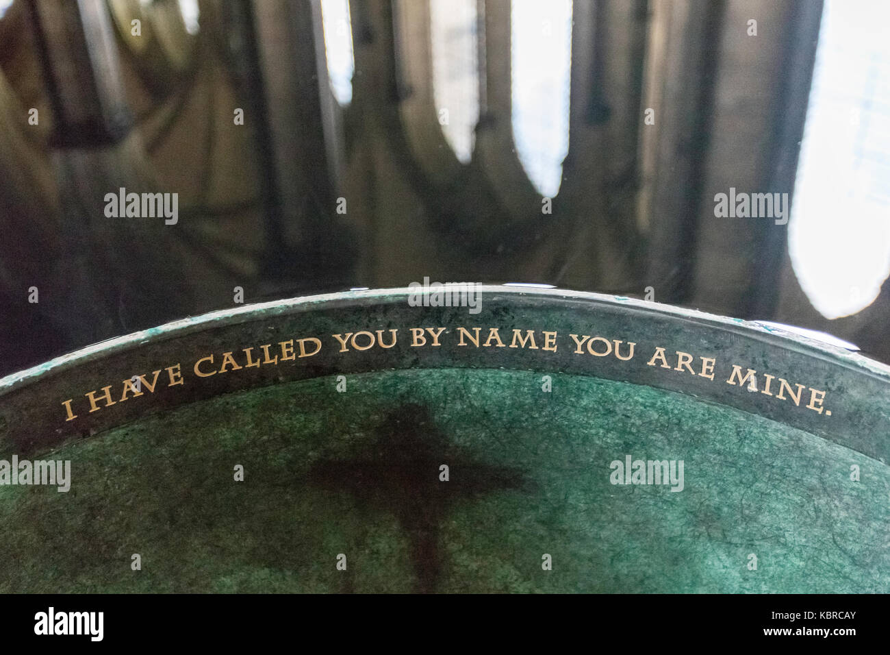 'I have called you by name you are mine'. inscription on font at Salisbury Cathedral, UK Stock Photo
