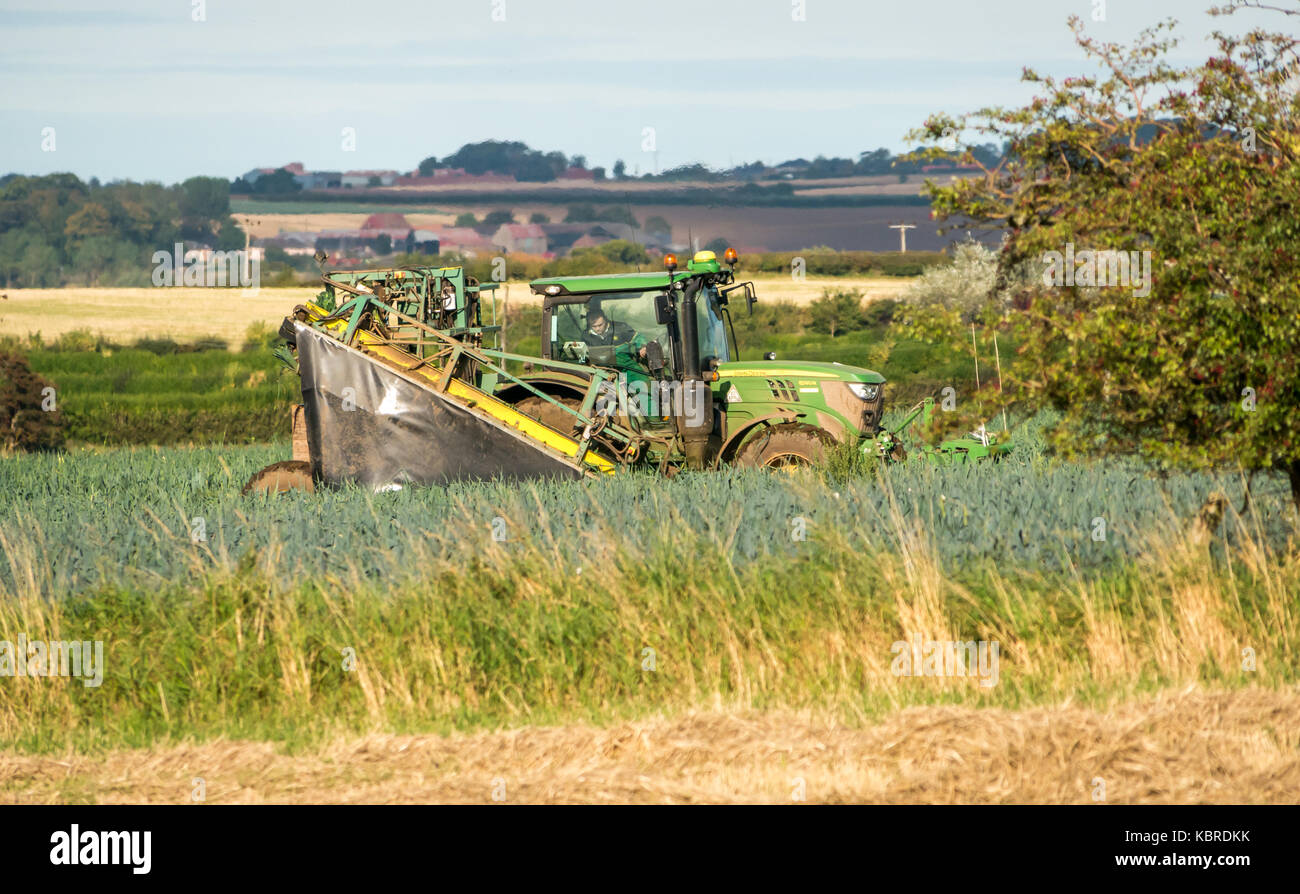 Man driving tractor hires stock photography and images Alamy