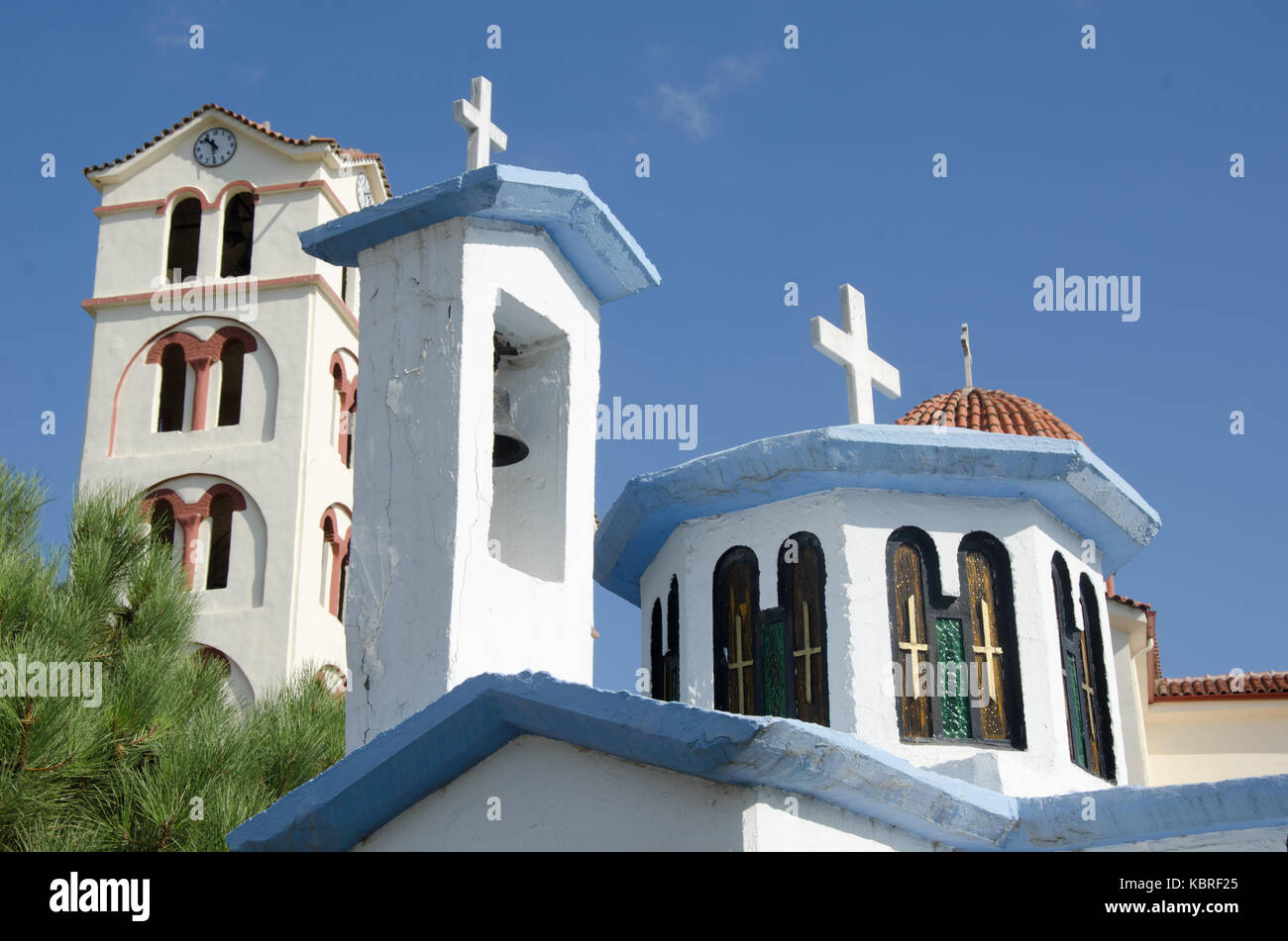 orthodox church with cross and window on a sunny day Stock Photo - Alamy