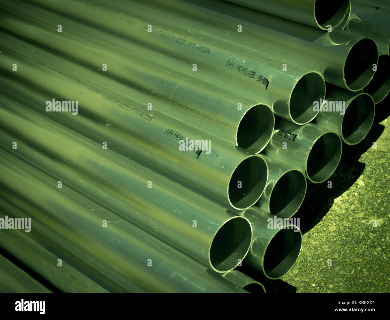 Stack of Many Pipes at the Construction Site Stock Photo