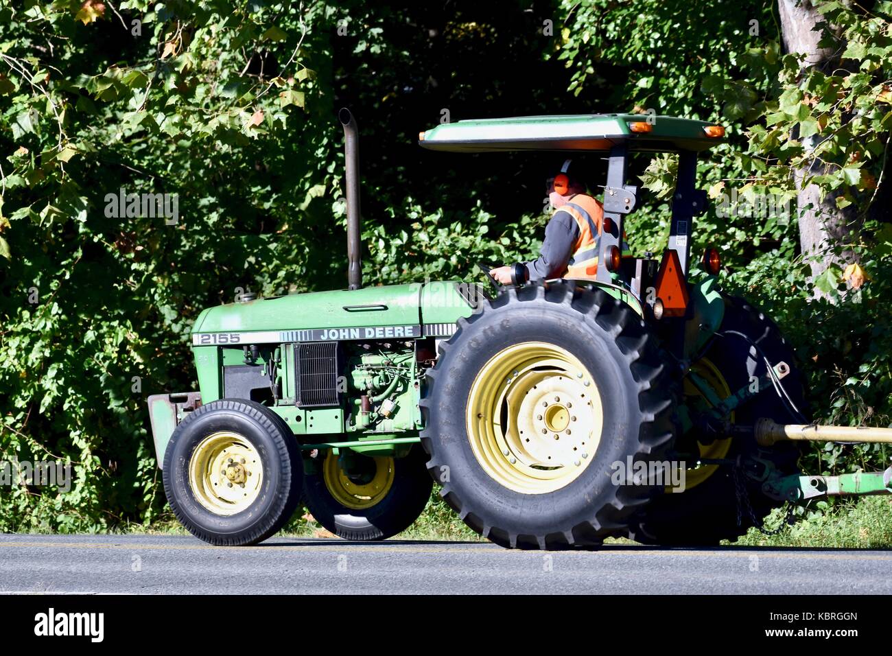 Farmer driving john deere tractor hi-res stock photography and images -  Alamy