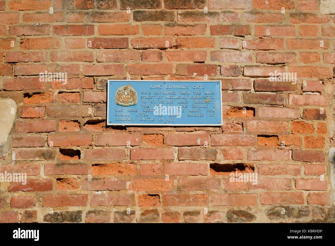 Street scene from Gloucester,England. Plaque marking King Edward's Gate