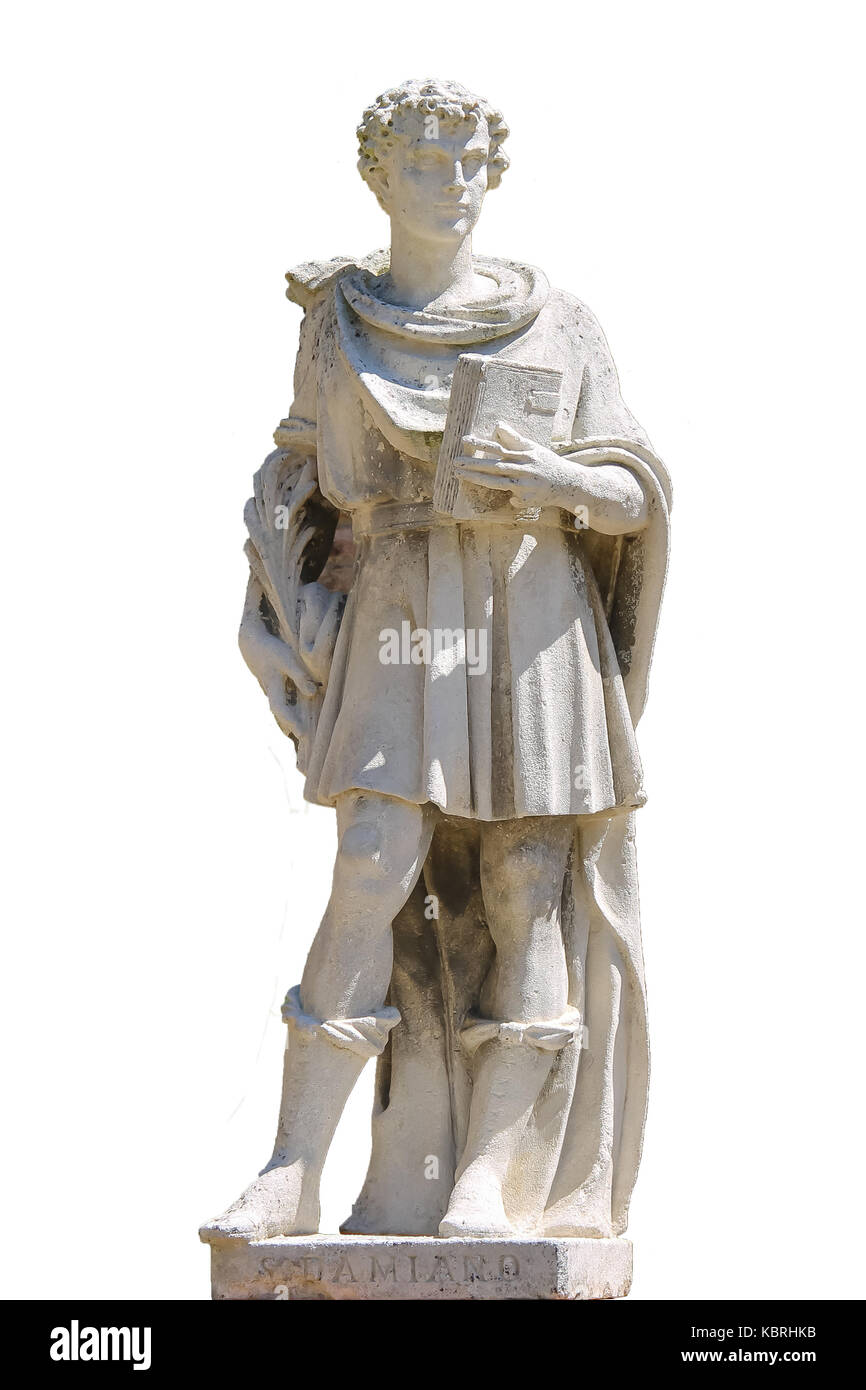 Marble statue of St. Damian in Grazzano Visconti, Italy. On white background Stock Photo