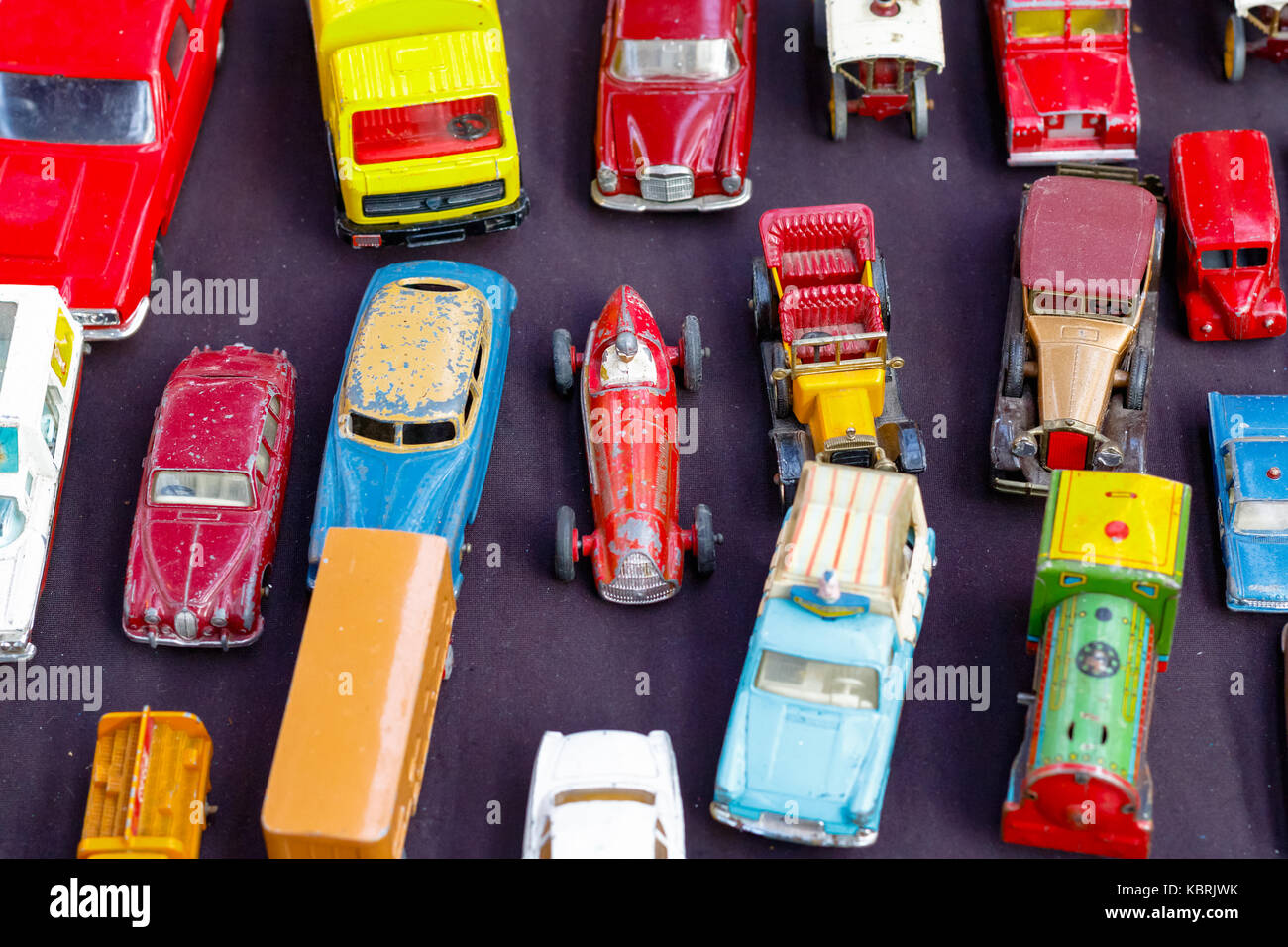 Old toy cars displayed at a junk shop in Old Spitalfields Market in London Stock Photo