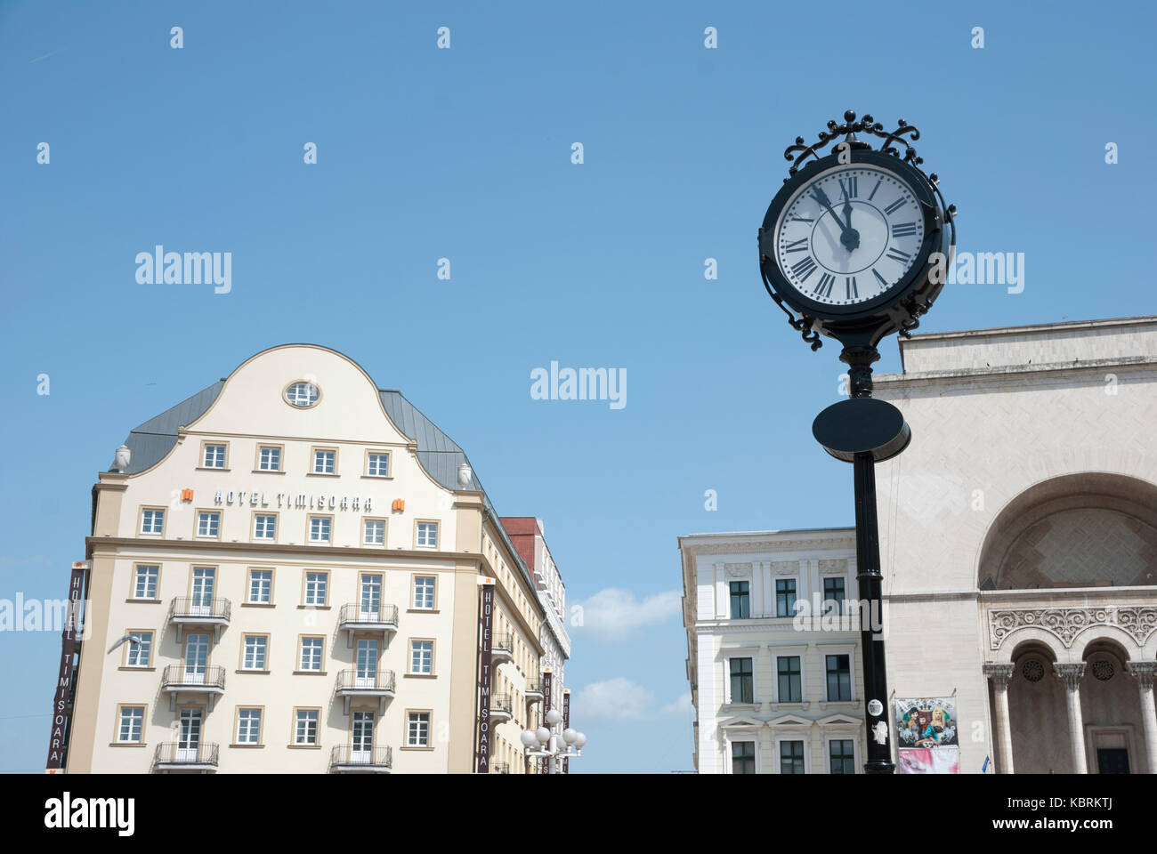 Main square with clock in Timisoara, Romania Stock Photo