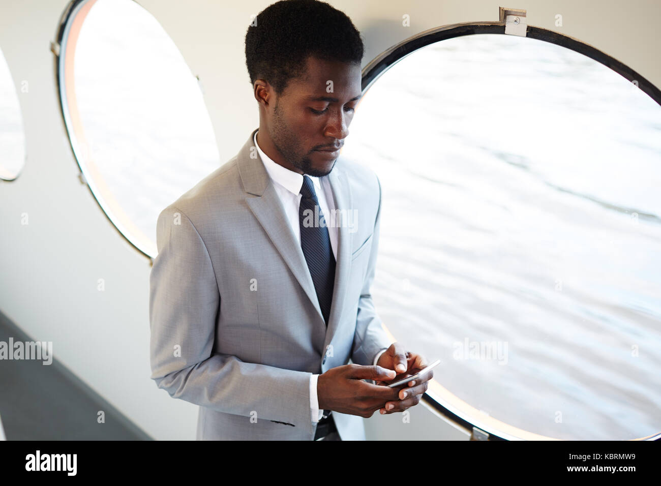 Businessman messaging Stock Photo