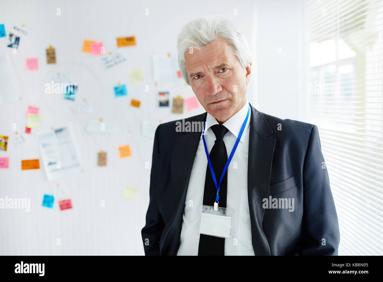 Mature Police Officer at Workplace Stock Photo