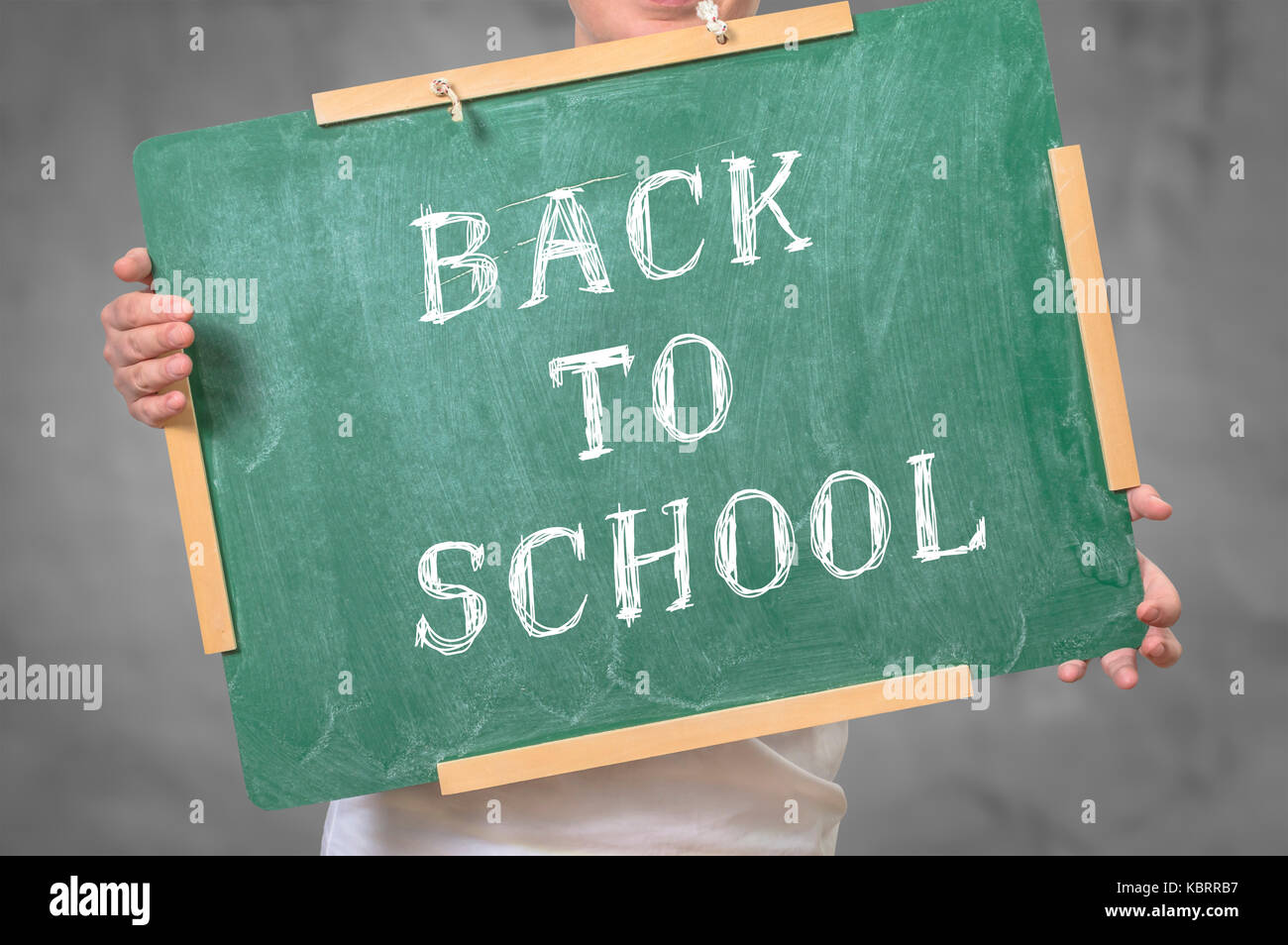 Back to school written on chalkboard. Education concept. Stock Photo