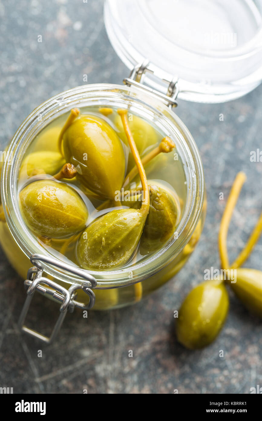Pickled caper berries in jar. Top view Stock Photo Alamy