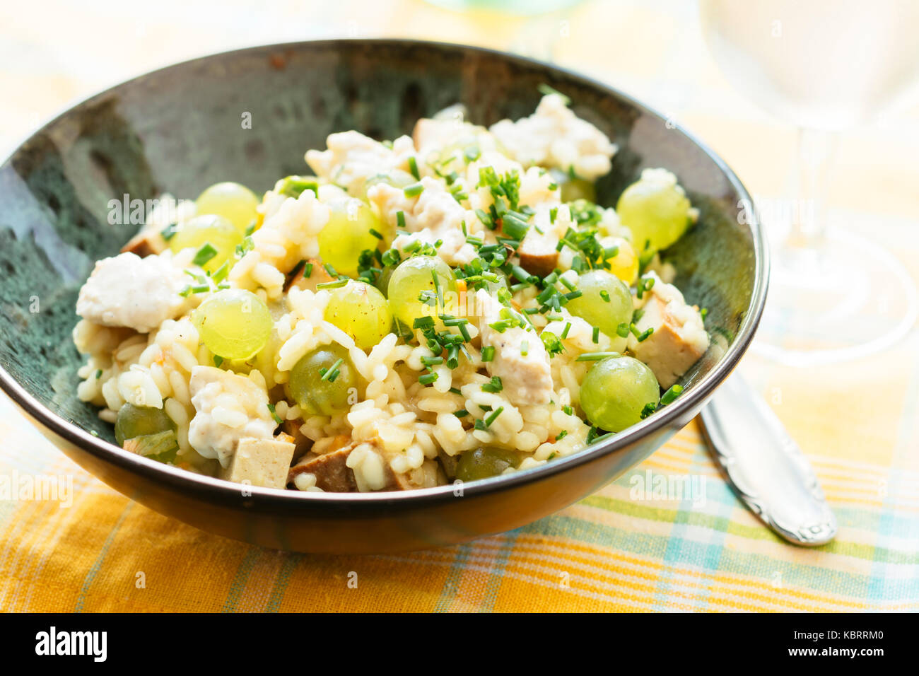 Risotto with Smoky Tofu and Grapes Stock Photo