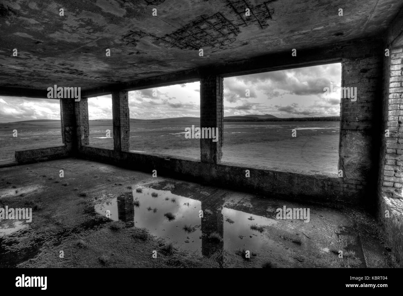 A HDR image of Bodmin Moor and Roughtor taken from an old World War II airfield control tower at Davidstow. Stock Photo