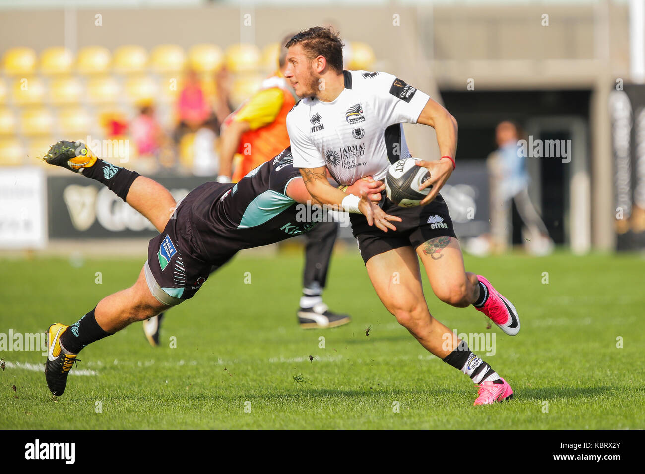 Parma, Italy. 30th September 2017. Zebre's full back Matteo Minozzi avoids a tackle with a side step in the match against Ulster in Guinness PRO14 rugby championship. Massimiliano Carnabuci/Alamy Live News Stock Photo