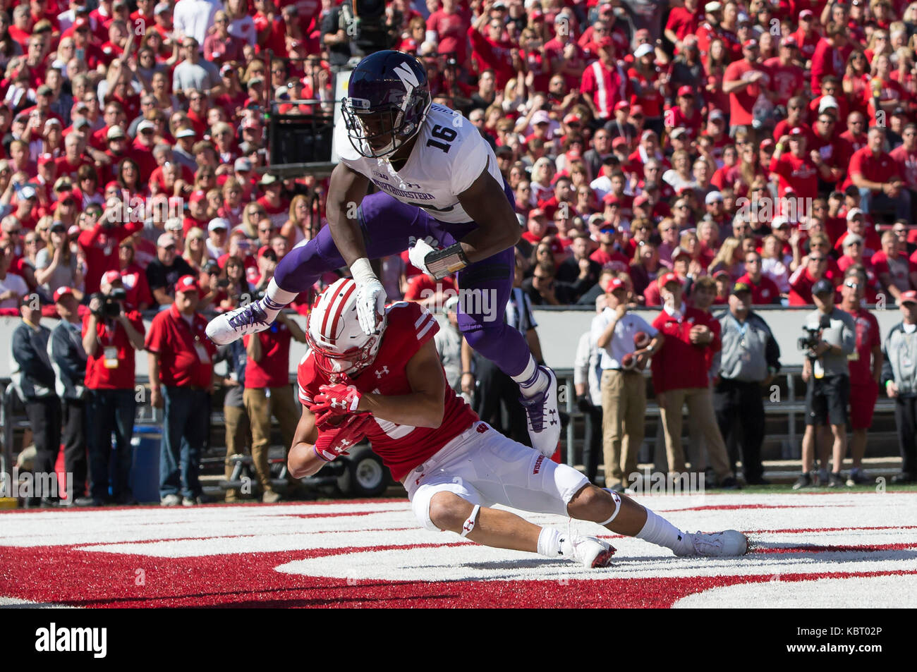 Madison, WI, USA. 30th Sep, 2017. Wisconsin Badgers wide receiver Danny Davis III #6 scores on a 5 yard touchdown pass during the NCAA Football game between the Northwestern Wildcats and the Wisconsin Badgers at Camp Randall Stadium in Madison, WI. Wisconsin defeated Northwestern 33-24. John Fisher/CSM/Alamy Live News Stock Photo