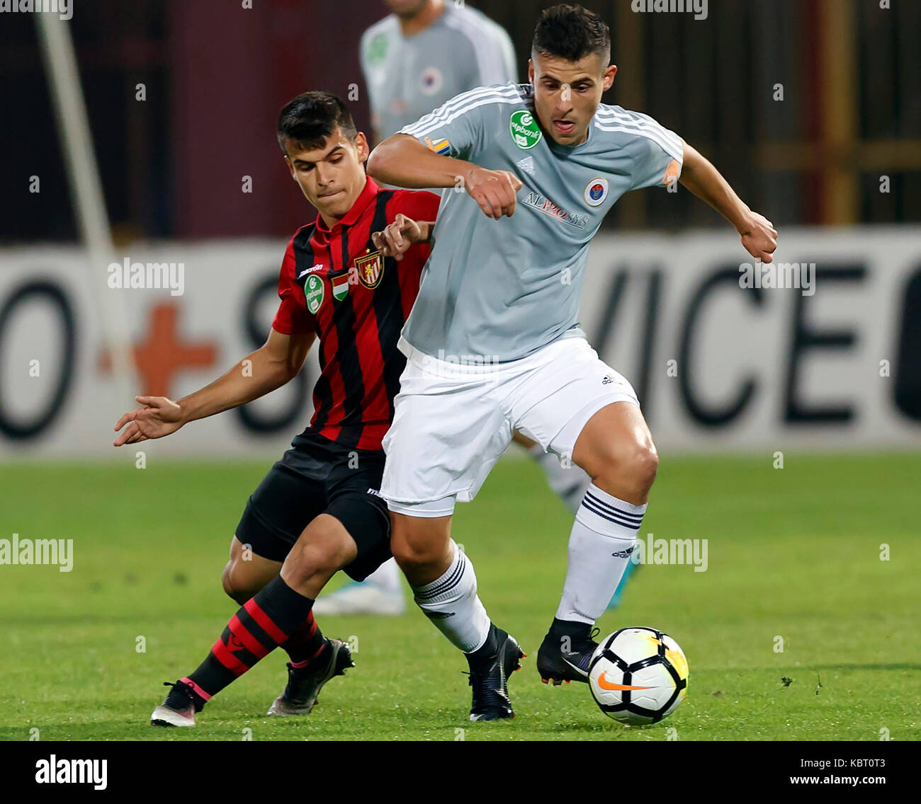 Budapest, Hungary. 30th Sep, 2017. Zsombor Berecz (R) of Vasas FC wins the  ball from Bence Bano-Szabo (L) of Budapest Honved during the Hungarian OTP  Bank Liga match between Budapest Honved and