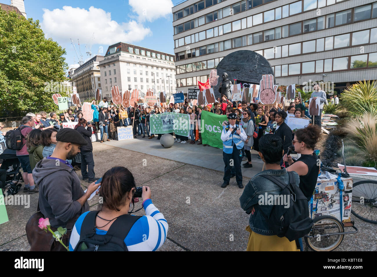 London, UK. 30th September, 2017. Protesters at the rally at St Thomas' Hospital to call for an end to immigration checks and charging of migrants for NHS services. The Migrants Welcome bloc, Maternity Care bloc and Sisters bloc met opposite the hospital and marched onto the area around the memorial to Jamaican -born Crimean War nurse Mary Seacole for a rally at which a number of testimonies of those who have suffered from these policies were read out. Credit: Peter Marshall/Alamy Live News Stock Photo