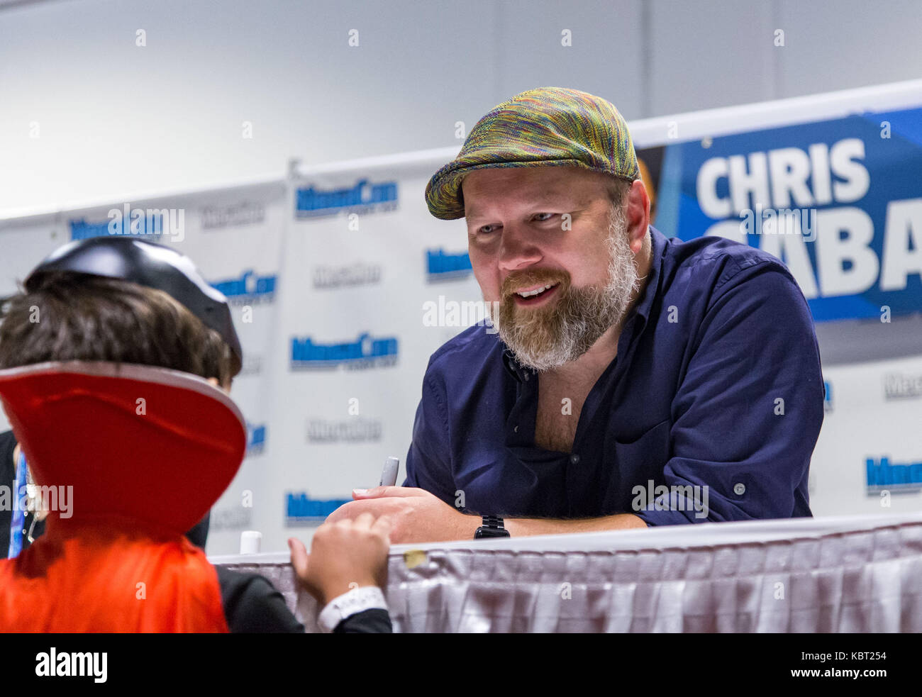 Tampa, Florida, USA. 30th Sep, 2017. Chris Sabat interacts with a fan