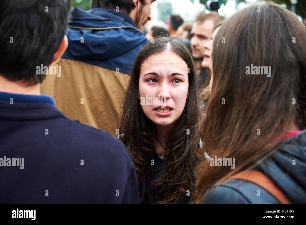 Girona, Spain. 1 October, 2017. A women cries at Sant Julia de Ramis, place of vote of the catalan president Carles Puigdemont. The Guardia Civil charge against the people impeding that makes a vote. The referendum has been deemed illegal by the Spanish government in Madrid Credit: Pablo Guillen/Alamy Live News Stock Photo