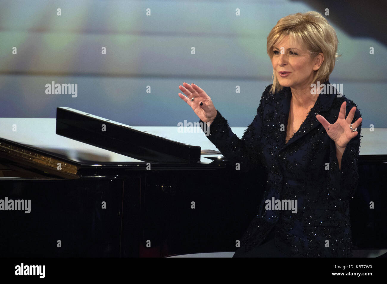 Donatee Melanie (l-r), donor Niklas and presenter Carmen Nebel on stage  during the ZDF TV show Willkommen bei Carmen Nebel at the TUI-Arena in  Hanover, Germany, 30 September 2017. Photo: Swen Pförtner/dpa