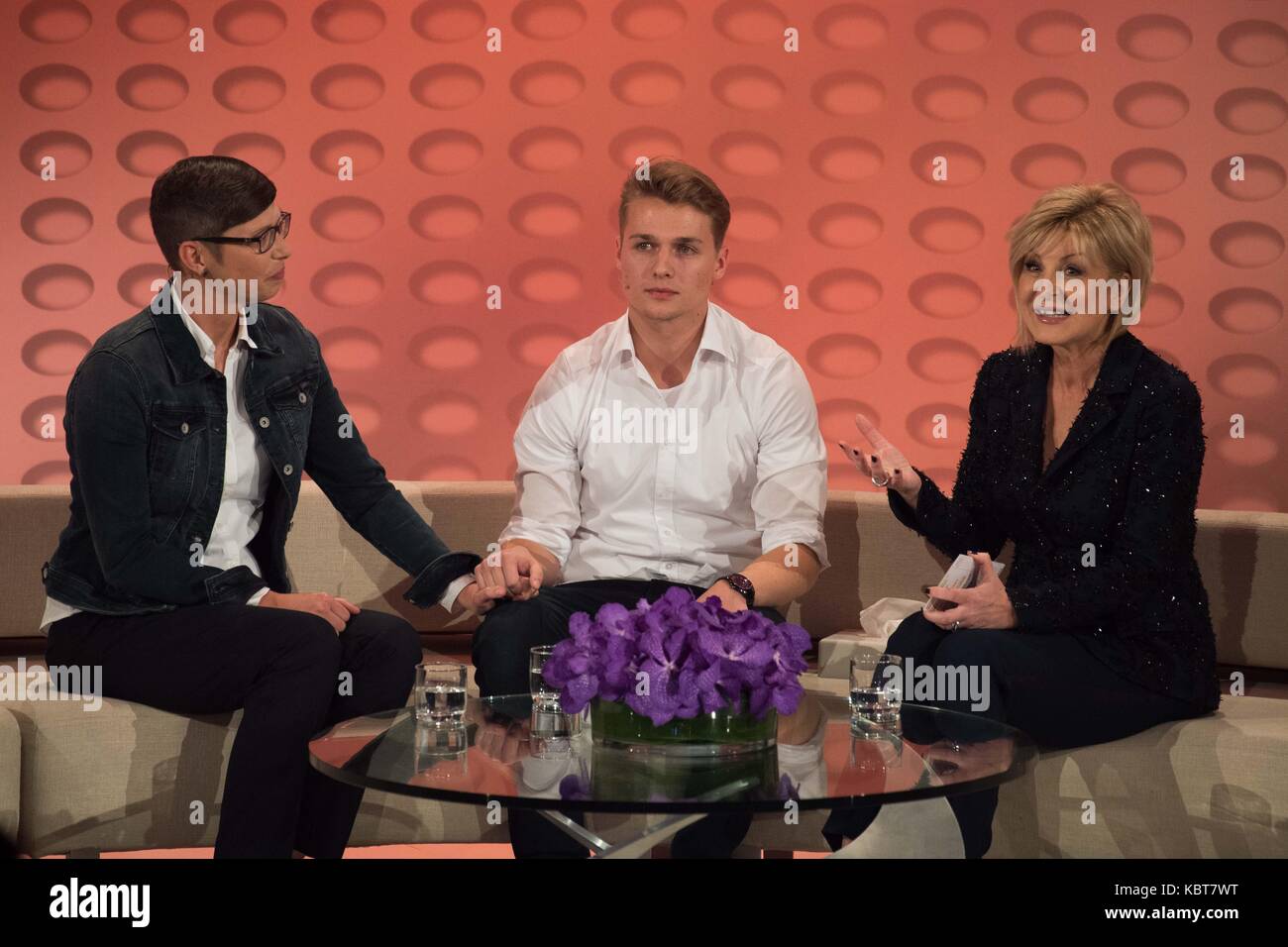Donatee Melanie (l-r), donor Niklas and presenter Carmen Nebel on stage  during the ZDF TV show Willkommen bei Carmen Nebel at the TUI-Arena in  Hanover, Germany, 30 September 2017. Photo: Swen Pförtner/dpa