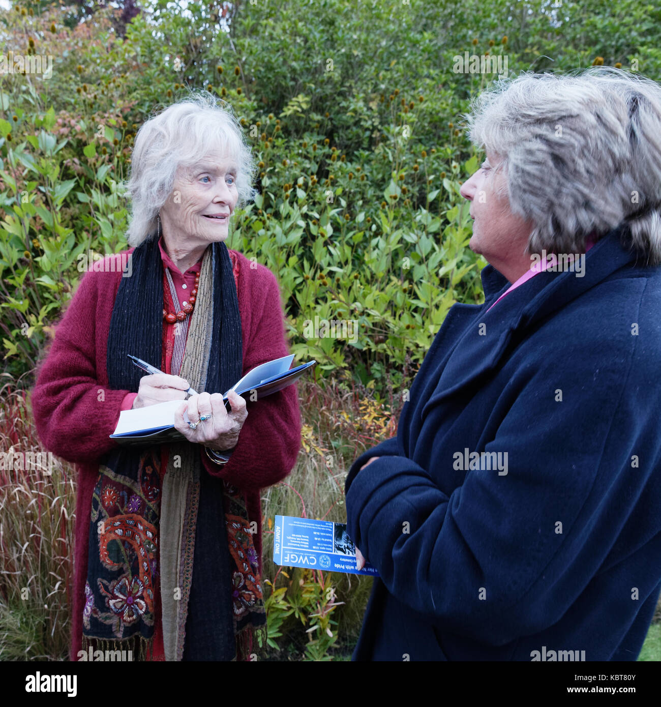 Commonwealth War Graves Cemetery Brookwood Surrey England. Virginia McKenna signs the book authored by Tania Szabo about her mother Violette whom she played in the 1958 film. Stock Photo