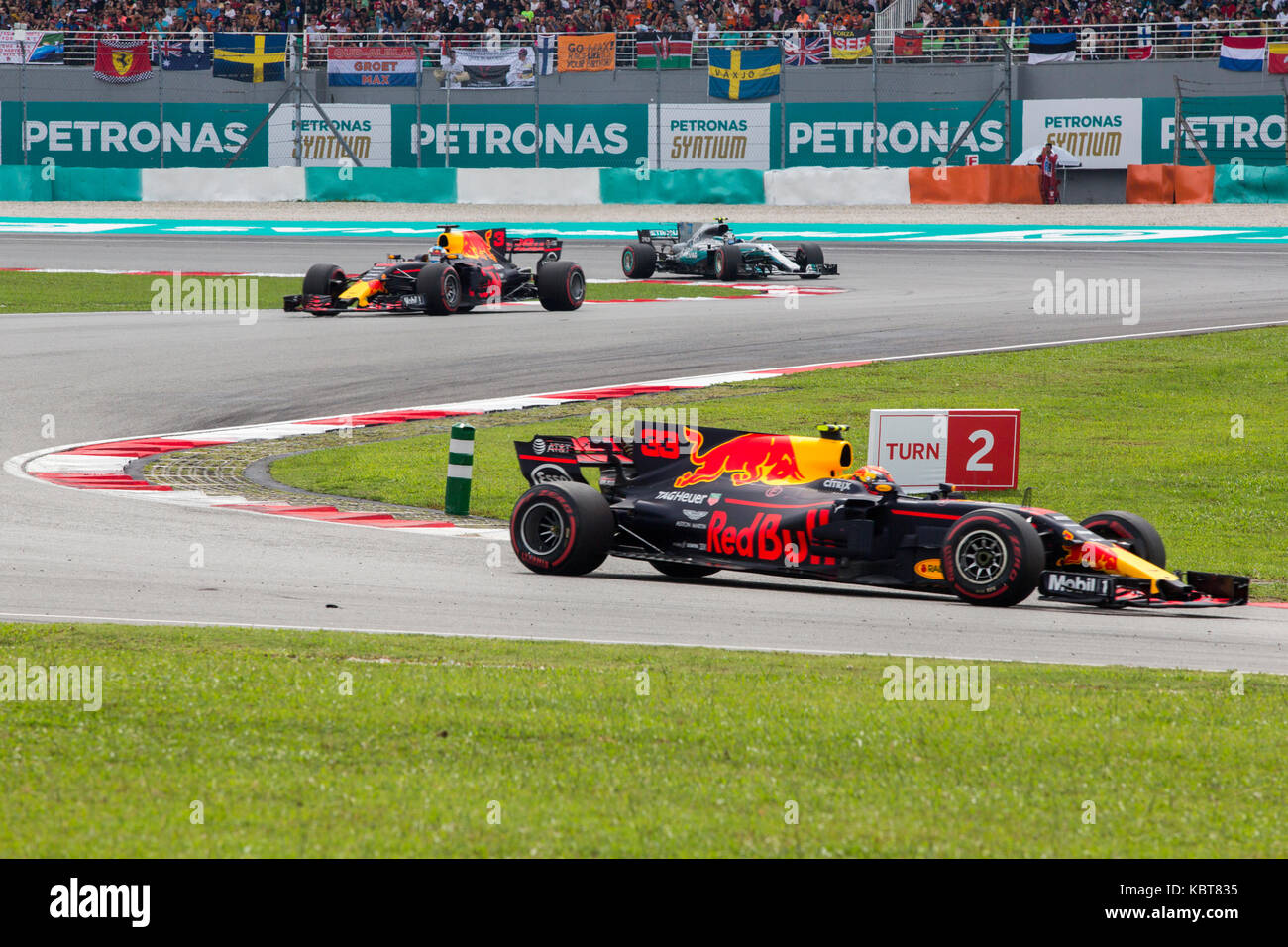 Max Verstappen from RBR TAG Heuer takes lead in the F1 Grand Prix at the Sepang F1 circuit. Verstappen finished the race in the first position. On October 01, 2017 in Kuala Lumpur, Malaysia. Stock Photo