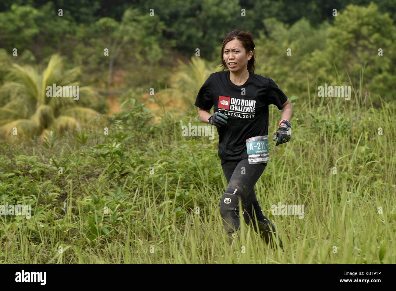 Cyberjaya, MALAYSIA. 1st Oct, 2017. Amateur Female trail runner pictured  during the North Face Outdoor Challenge, Malaysia on October 1st, 2017 in  Cyberjaya, Malaysia. Hundreds of participants gathered for this event.  Credit: