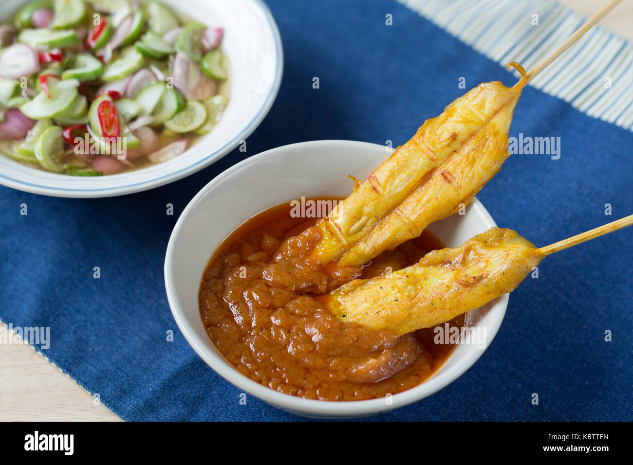 Grilled chicken satay with peanut sauce and vinegar of vegetable mix