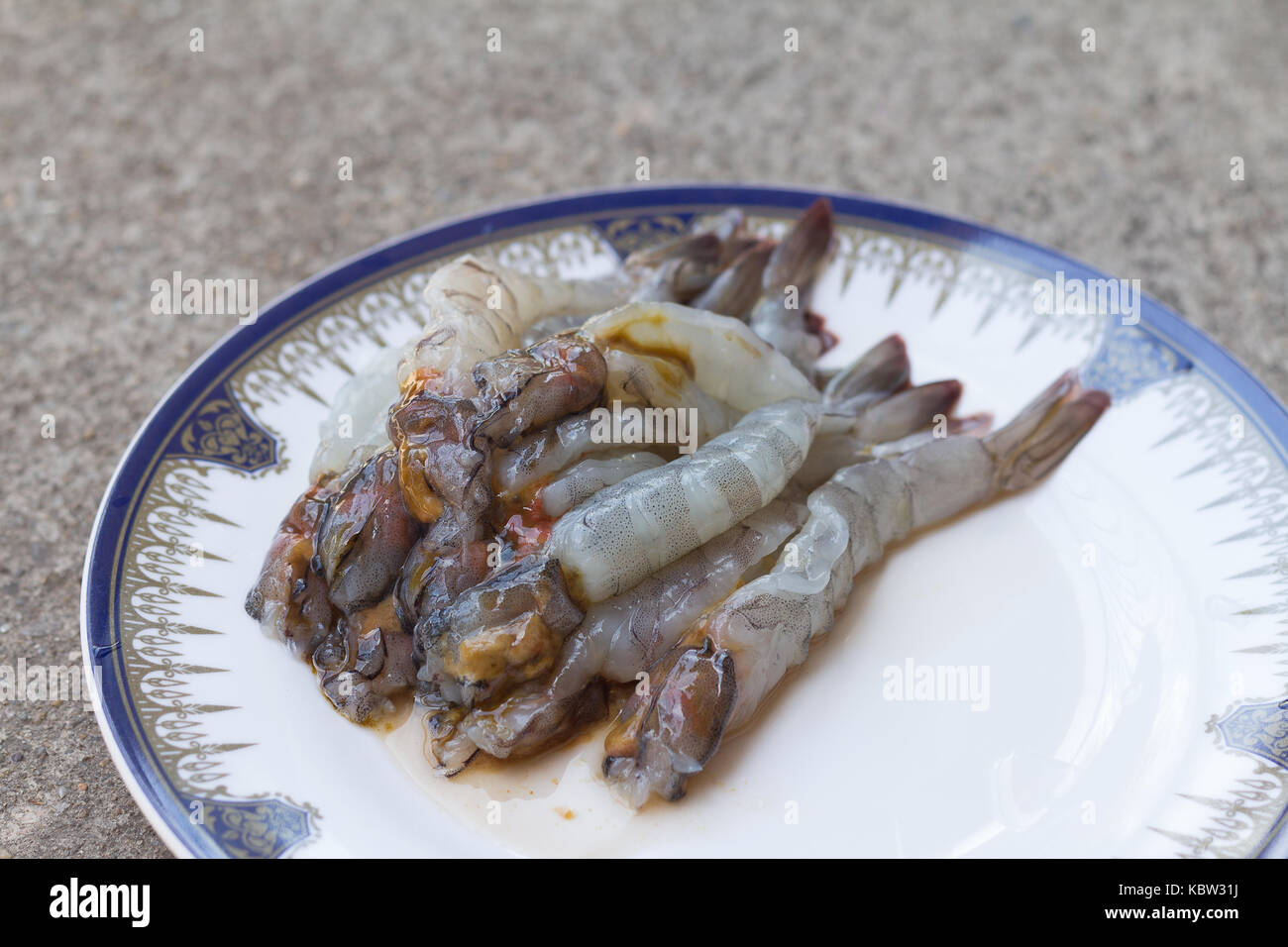 Raw shrimp in a dish that prepared for cooking(soft focus) Stock Photo