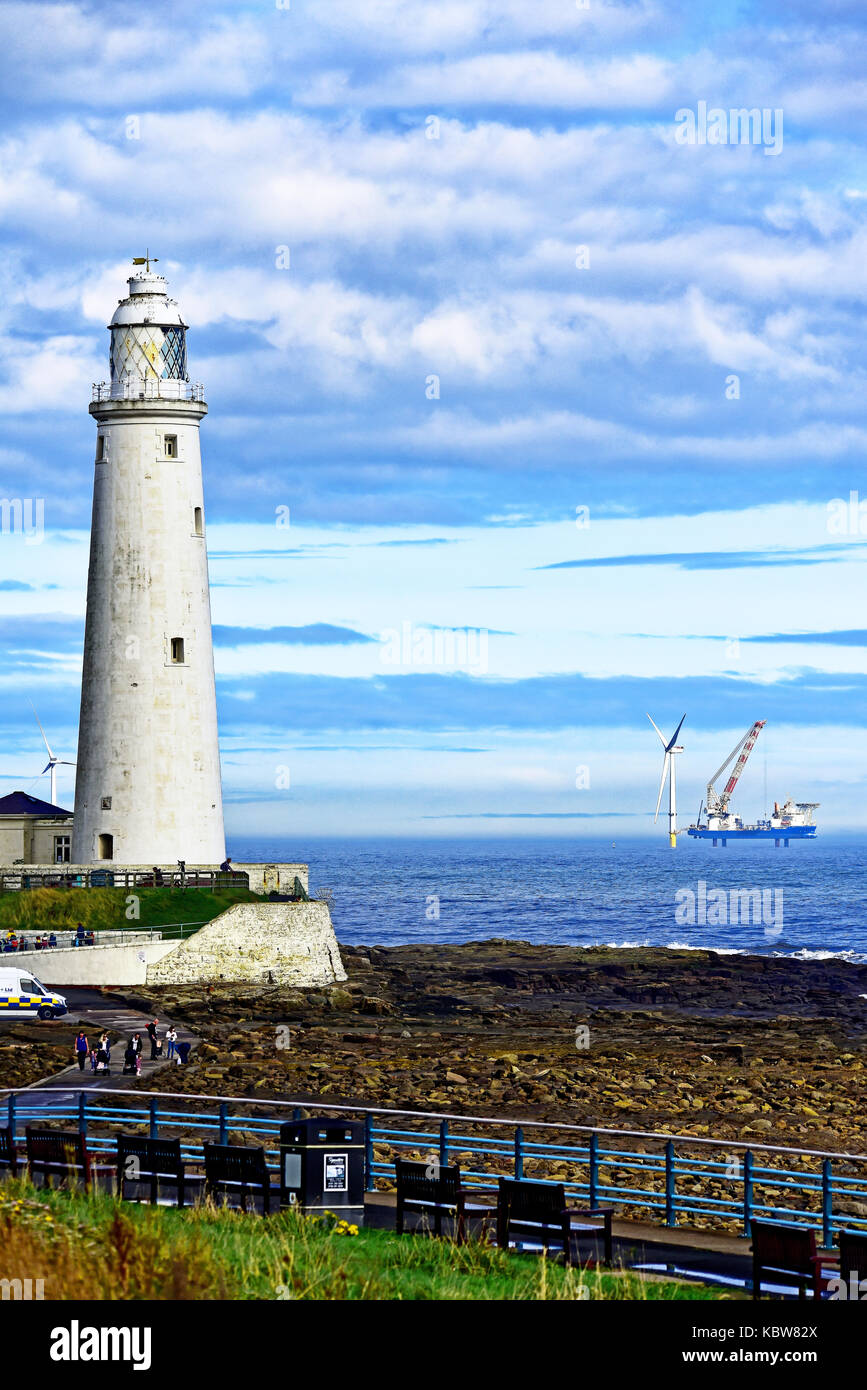 Whitley Bay St Marys lighthouse with the barge Vole au Vent installing