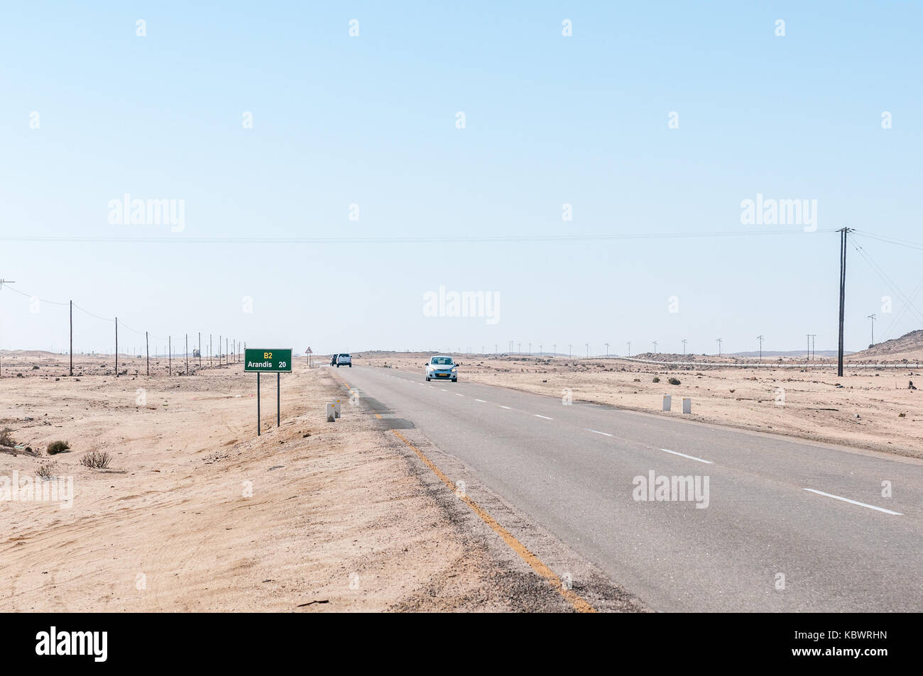 SWAKOPMUND, NAMIBIA - JULY 3, 2017: The B2-road between Swakopmund and Arandis in the Namib Desert of Namibia Stock Photo