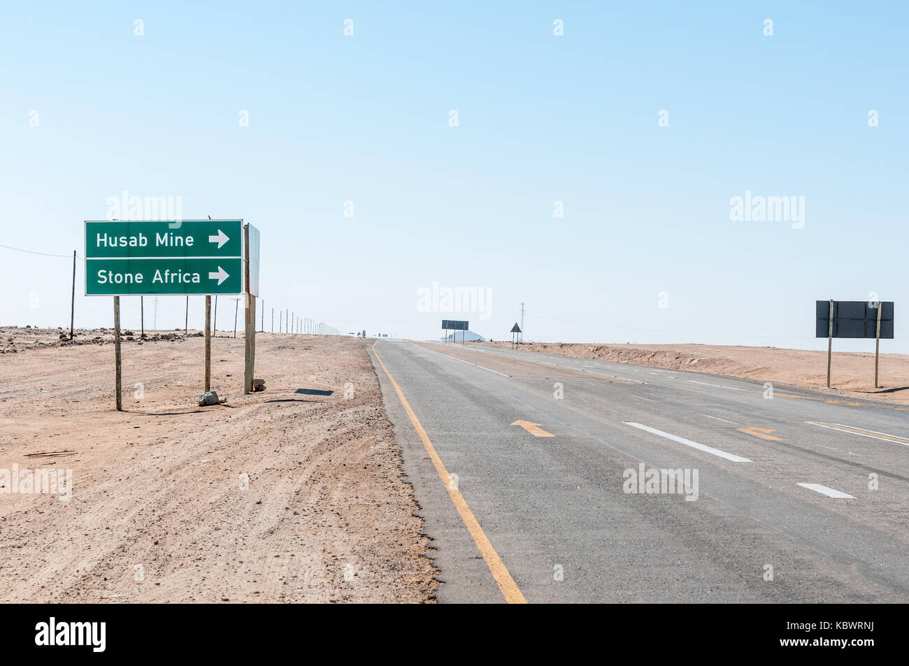 ARANDIS, NAMIBIA - JULY 3, 2017: The turn-off to the Husab Mine and Stone Africa from the B2-road between Swakopmund and Arandis in the Namib Desert o Stock Photo