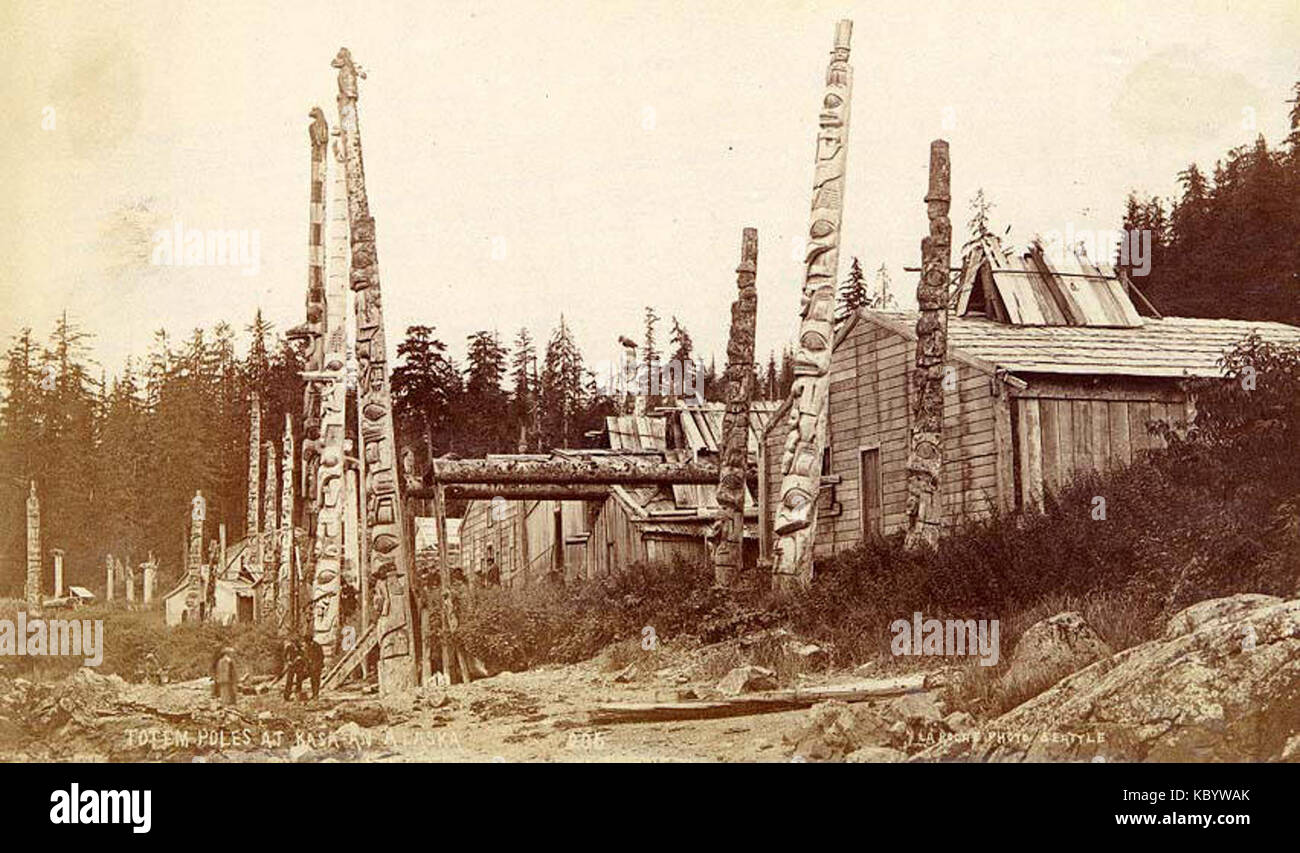 Haida totem poles and lodges at the village of old Kasaan, Alaska, ca ...