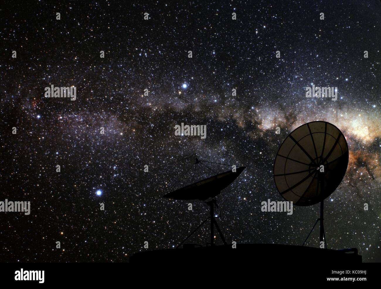 two satellite disk and galaxy in sky Stock Photo - Alamy