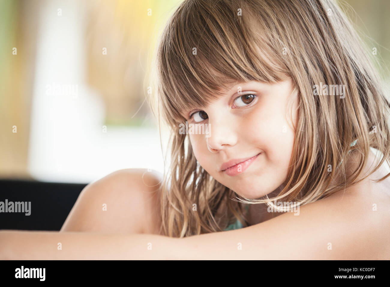 Serious Blond Caucasian little girl, close-up outdoor face portrait Stock Photo