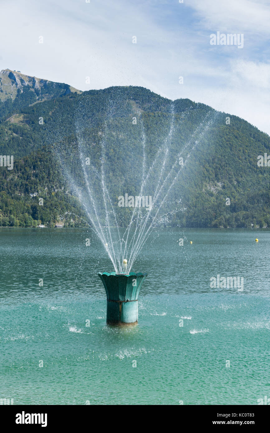 Fountain in Lake Wolfgang at St. Gilgen Stock Photo