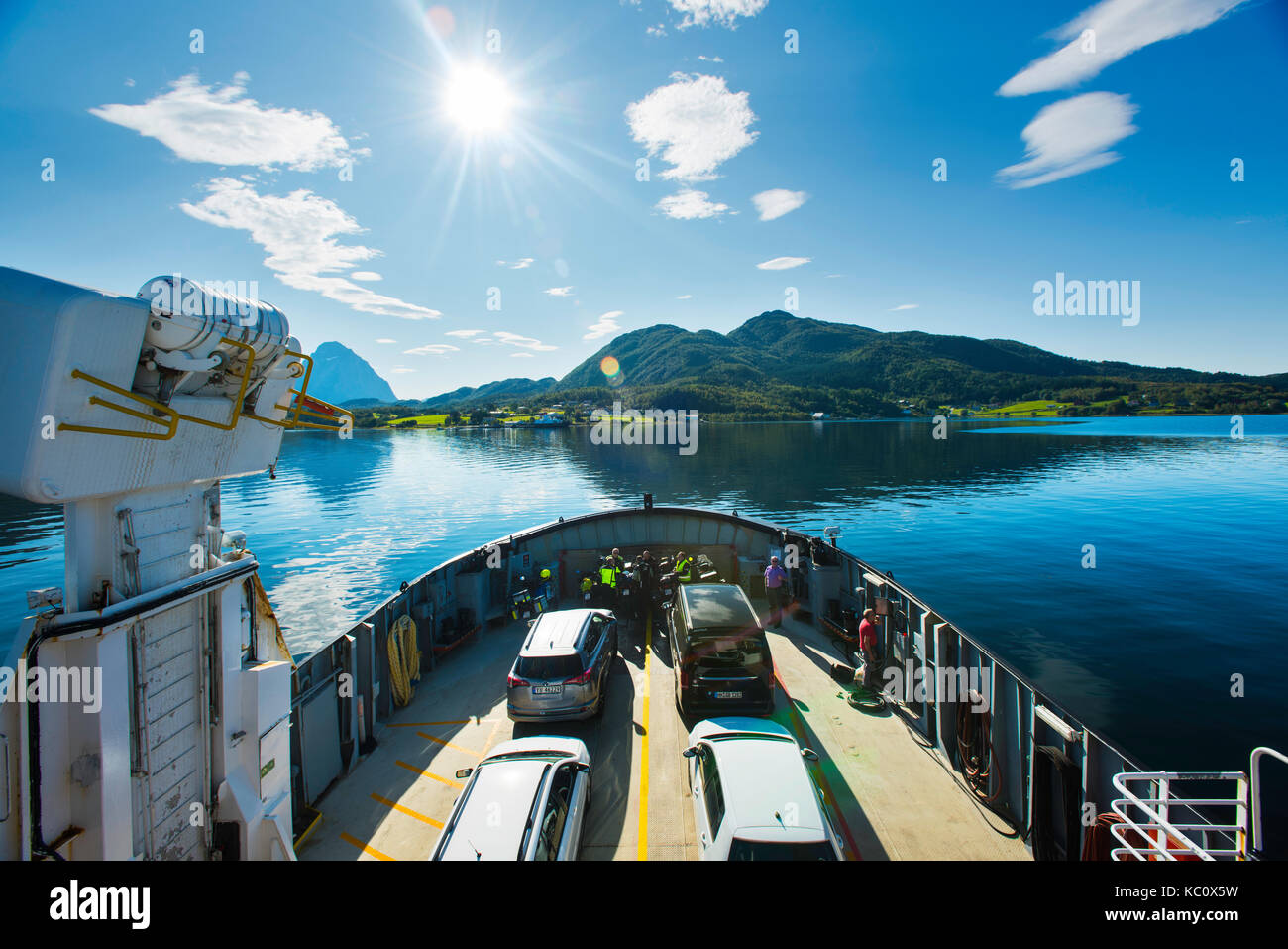 Kystriksveien - the coastal route along the Nordland coastline in Norway. Image taken on the Agskardet - Foroy ferry  as it is docking at Agskardet. Stock Photo