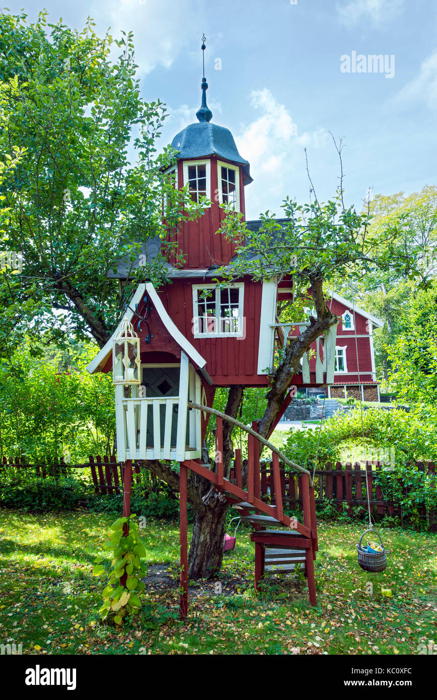 A treehouse in a graden in Wira Bruk, Sweden. Stock Photo