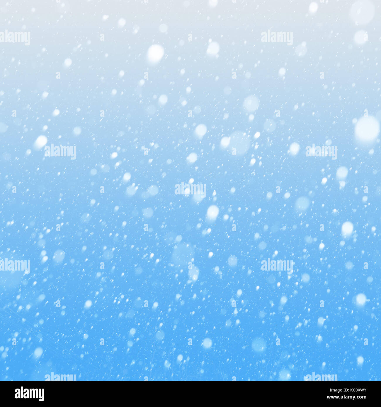 Art falling snow on the blue background Stock Photo - Alamy