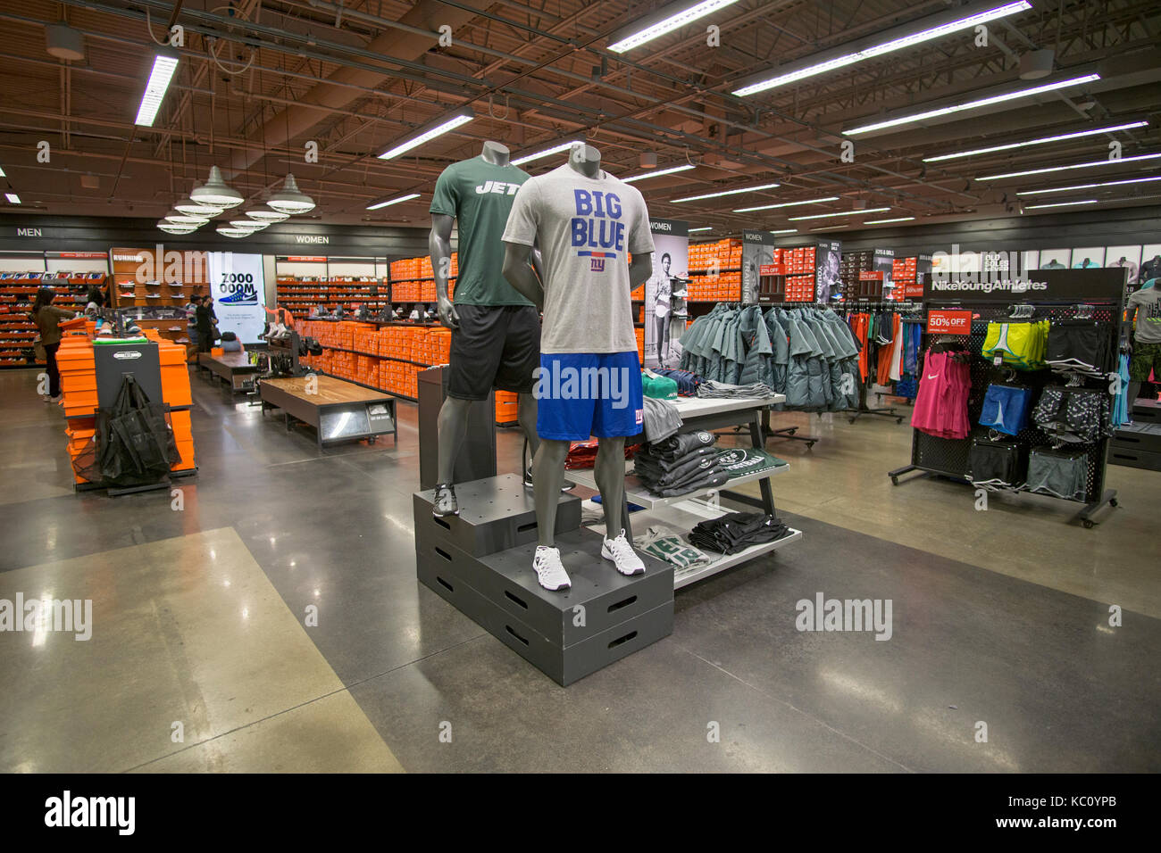 The interior of the Nike Factory Store at the Tanger Outlet Mall in Deer  Park Long Island, New York Stock Photo - Alamy