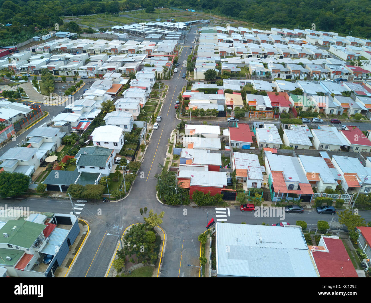 Main street in residential area aerial drone view Stock Photo