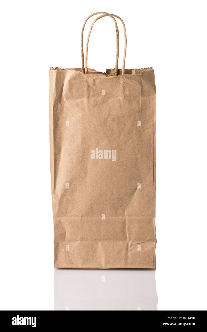 A brown paper bag, possibly for alcohol, facing forward, isolated on white with reflection Stock