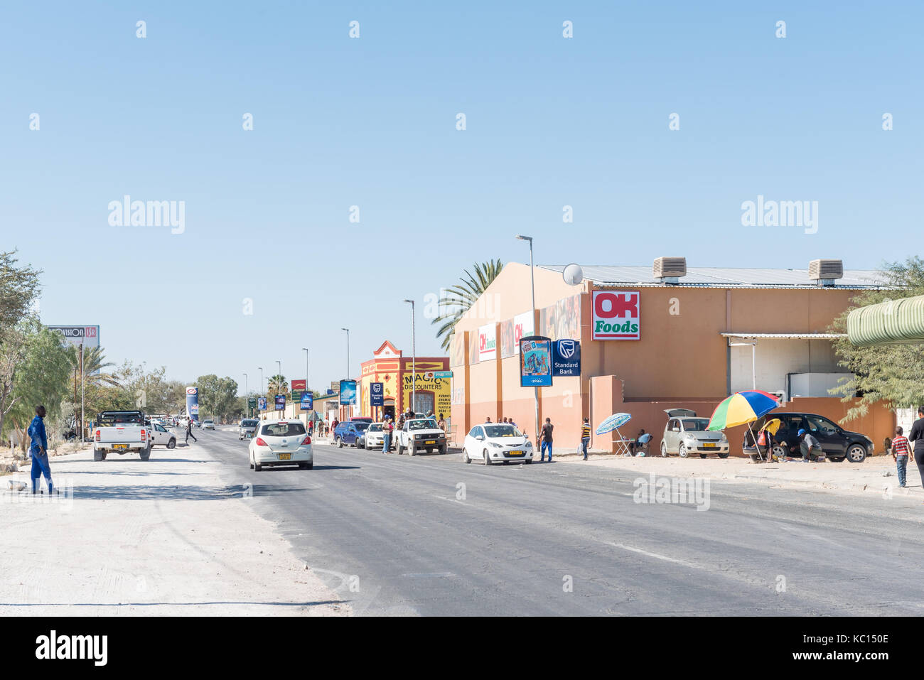 KARIBIB, NAMIBIA - JULY 3, 2017: A street scene with businesses and vehicles in Karibib, a small town in the Erongo Region of Namibia. Stock Photo