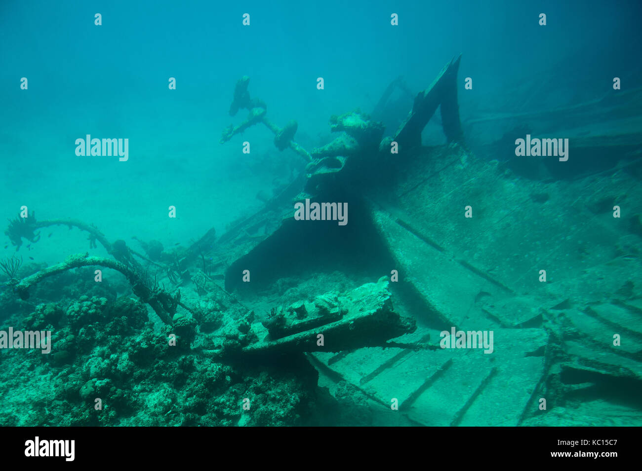 Metal bow of ship wreck on bottom of blue sea water Stock Photo