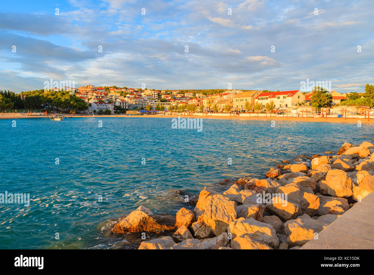 View of coast and beach at sunset time in Primosten town, Dalmatia, Croatia Stock Photo