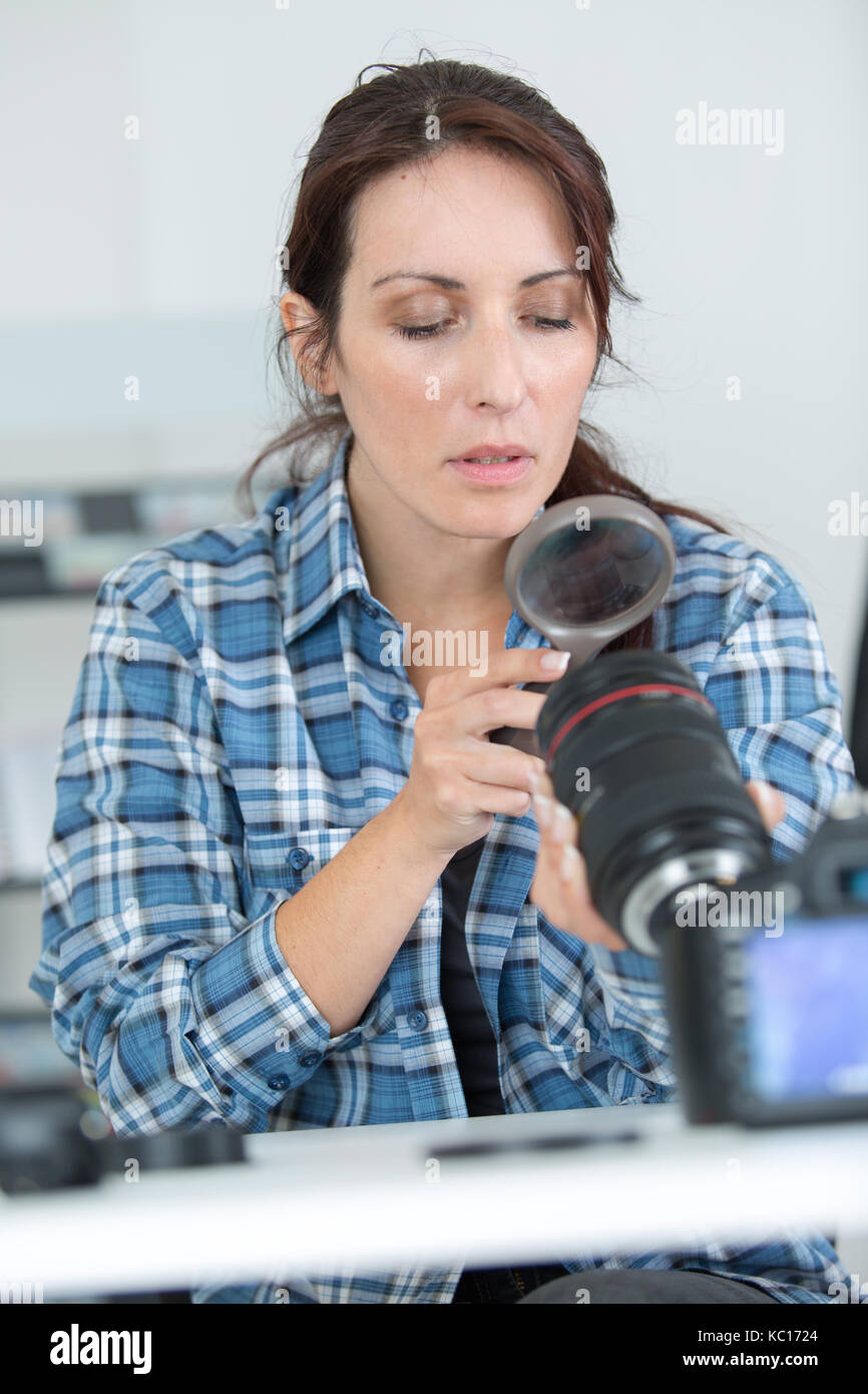 Lens Inspection Background inspecting the lens Stock Photo - Alamy