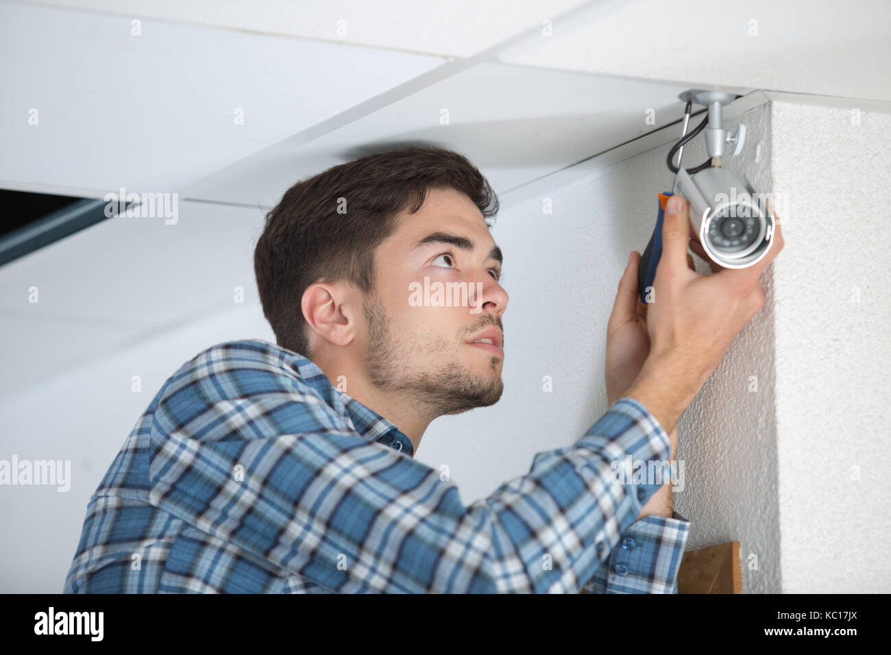 adjusting the CCTV position Stock Photo - Alamy