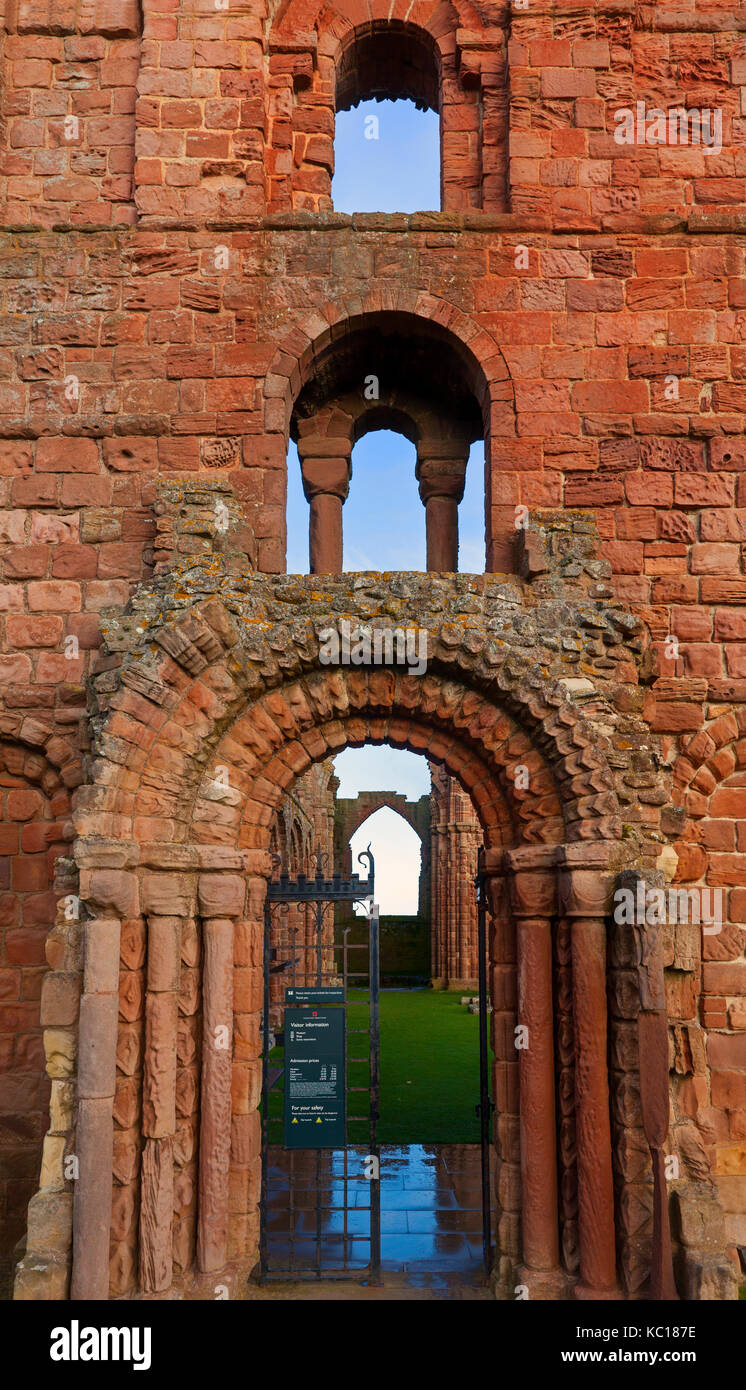 Romanesque doorway in Lindisfarne monastery, founded 634 by Saint Aidan. Holy Island, near Berwick-upon-Tweed, Northumberland, England Stock Photo