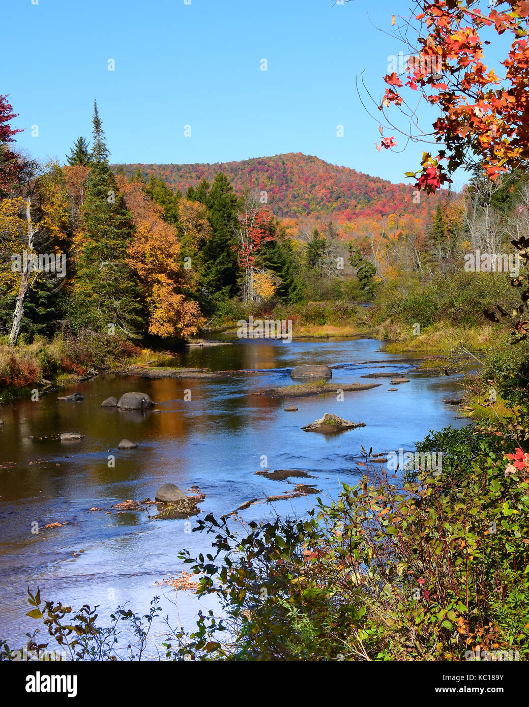 Scenic view of the Sacandaga River in the Adirondack Mountains in autumn. Stock Photo