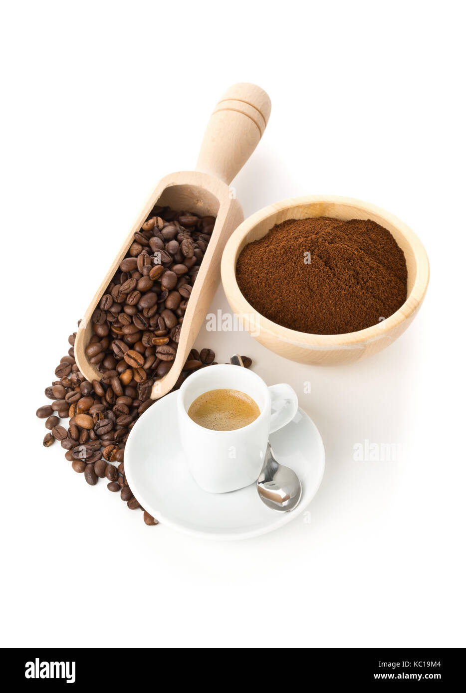 Ground coffee, coffee beans in wooden scoop and cup of espresso on white background Stock Photo